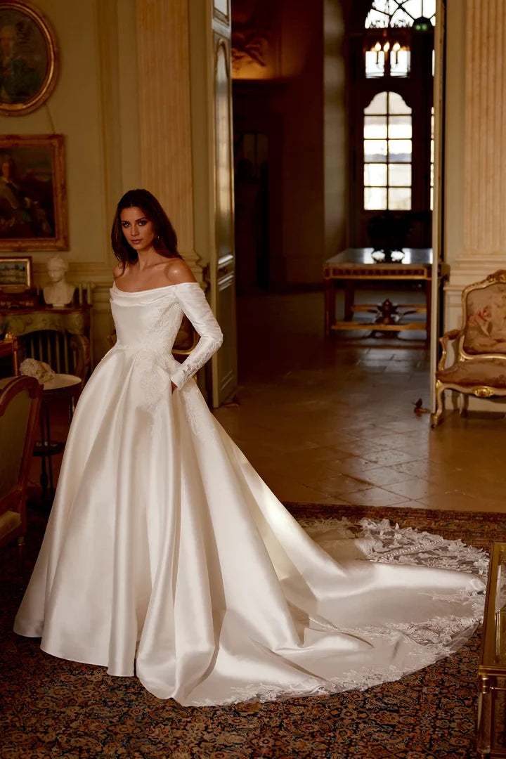 A-Line Gown with Off-The-Shoulder Neckline and Dramatic Train Wedding Dresses