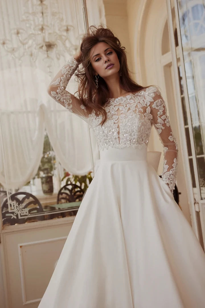A-Line Gown with Sheer Beaded Bodice and Detachable Bow Wedding Dresses