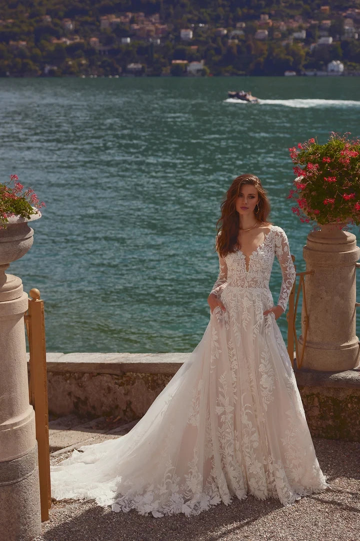 Beaded A-Line Gown with V-Neckline and Chapel Length Train Wedding Dresses