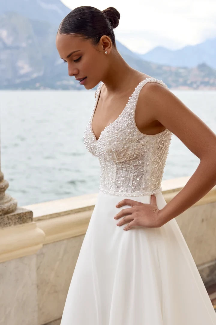 Beaded A-Line Gown with V-Neckline and Flowing Chiffon Skirt Wedding Dresses