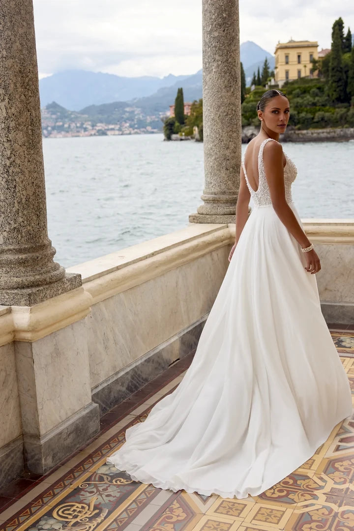 Beaded A-Line Gown with V-Neckline and Flowing Chiffon Skirt Wedding Dresses