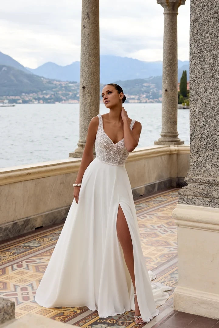 Beaded A-Line Gown with V-Neckline and Flowing Chiffon Skirt Wedding Dresses