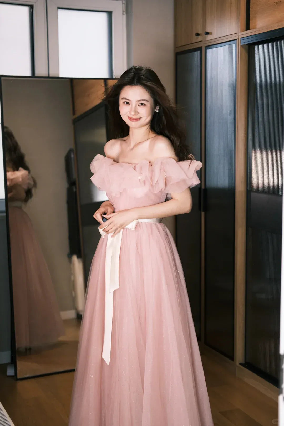 Blush Pink Off-the-Shoulder Ruffled Tulle Gown with Satin Sash