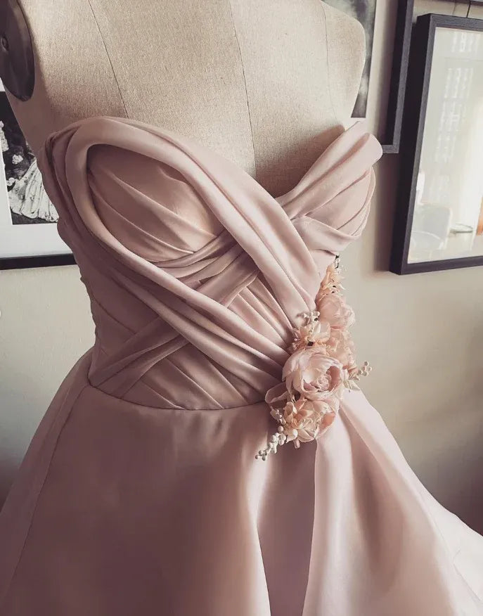 Blush Pink Strapless Ruffled Organza Ball Gown with 3D Floral Appliqué