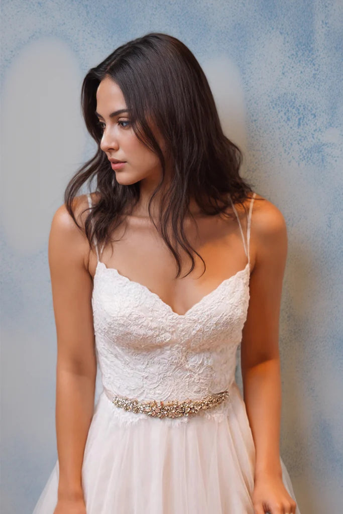 Bohemian tulle wedding dress with spaghetti straps, beaded lace bodice and beaded waist belt