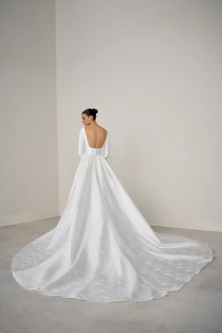Brocade A-Line Gown with Sabrina Neckline Long Sleeves and Open Back Wedding Dresses