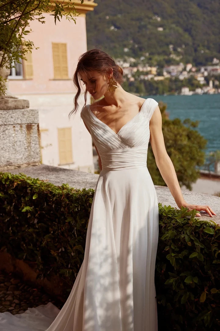 Chiffon A-Line Wedding Dress with Pleated V-Neckline and Bow Wedding Dresses