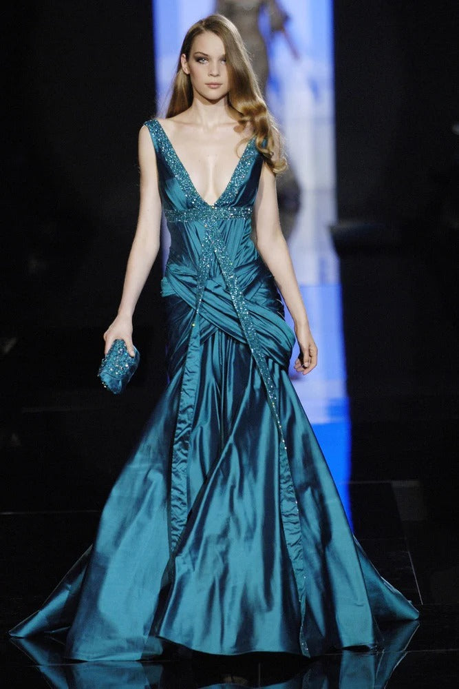 Deep V-Neck Sleeveless Evening Dress with Ruched Bodice & Train