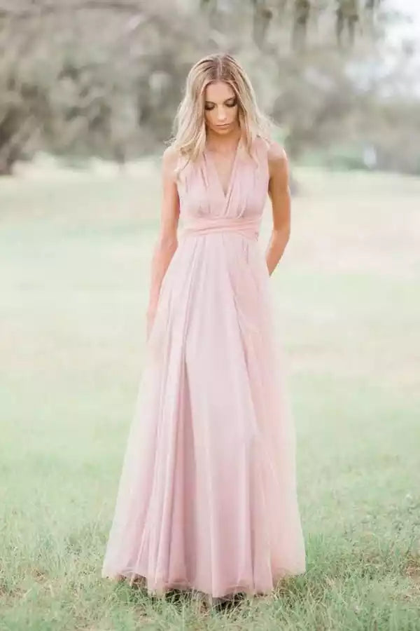 Dreamy Blush Pink Chiffon Gown with Cross-Back Halter & Tie Detail