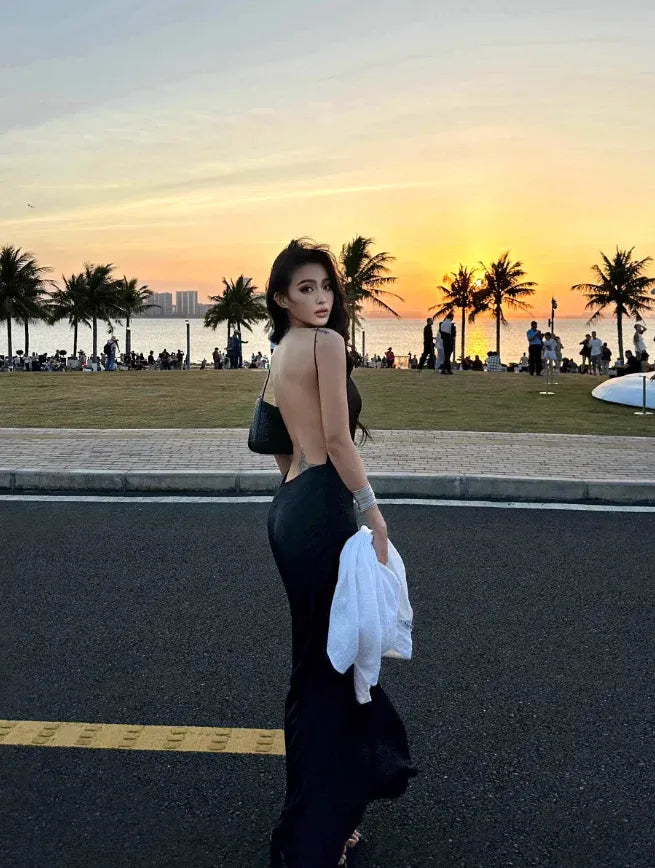 Effortlessly Elegant Spaghetti-Strap Open-Back Black Satin Slip Gown