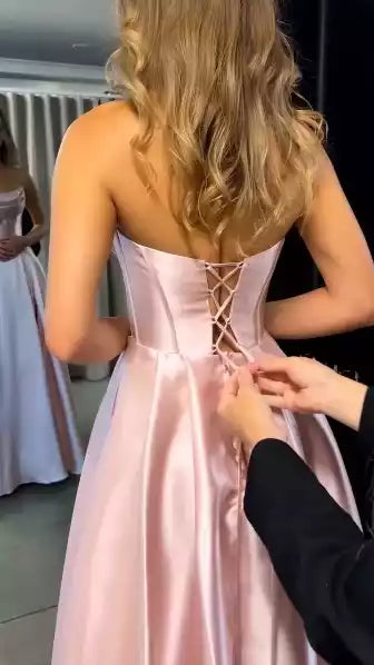 Elegant Blush Pink Satin Ballgown with Strapless Bodice & Lace-Up Back