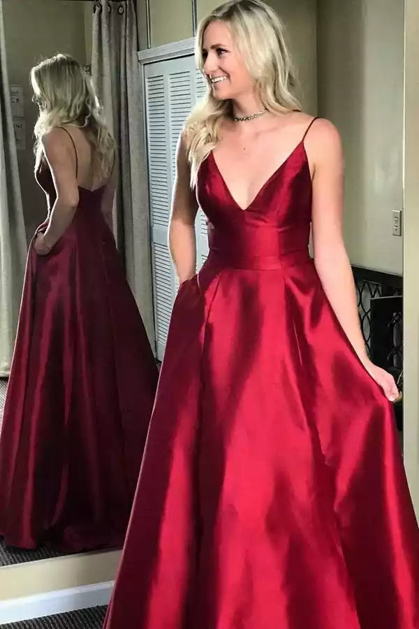 Elegant Burgundy Satin Gown with Deep V-Neck & Side Pockets