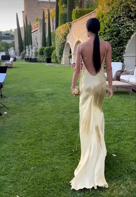 Elegant Champagne Satin Gown with Deep V-Neck & Open Back
