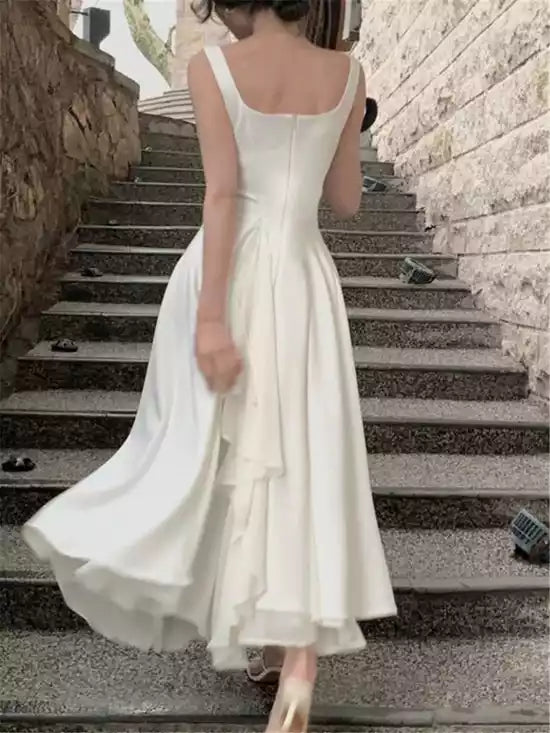Elegant Ivory Satin Gown with Square Neck & Asymmetrical Ruffle Hem