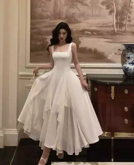 Elegant Ivory Satin Gown with Square Neck & Asymmetrical Ruffle Hem
