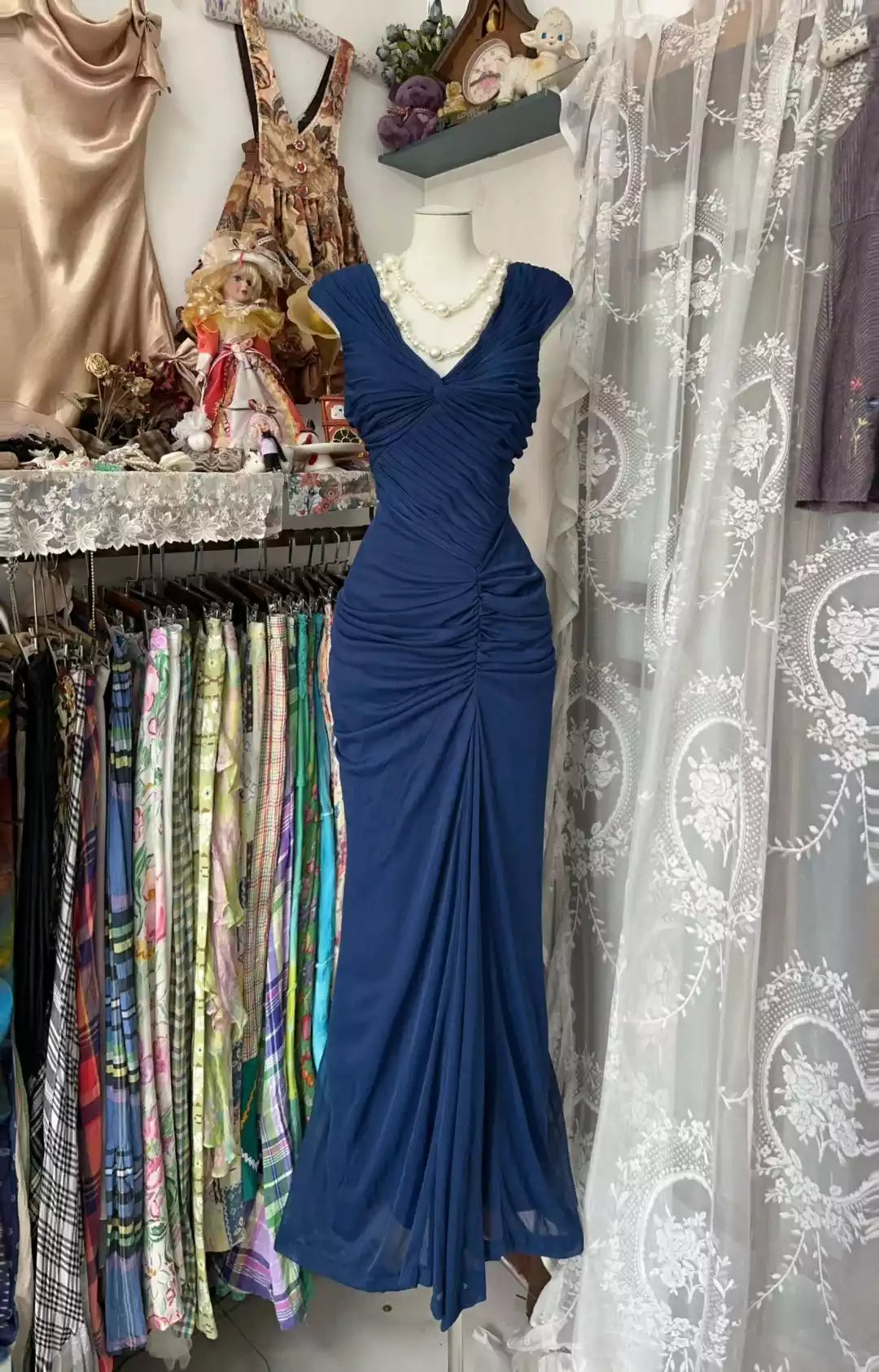 Elegant Navy Blue Ruched Chiffon Gown with Off-the-Shoulder Neckline