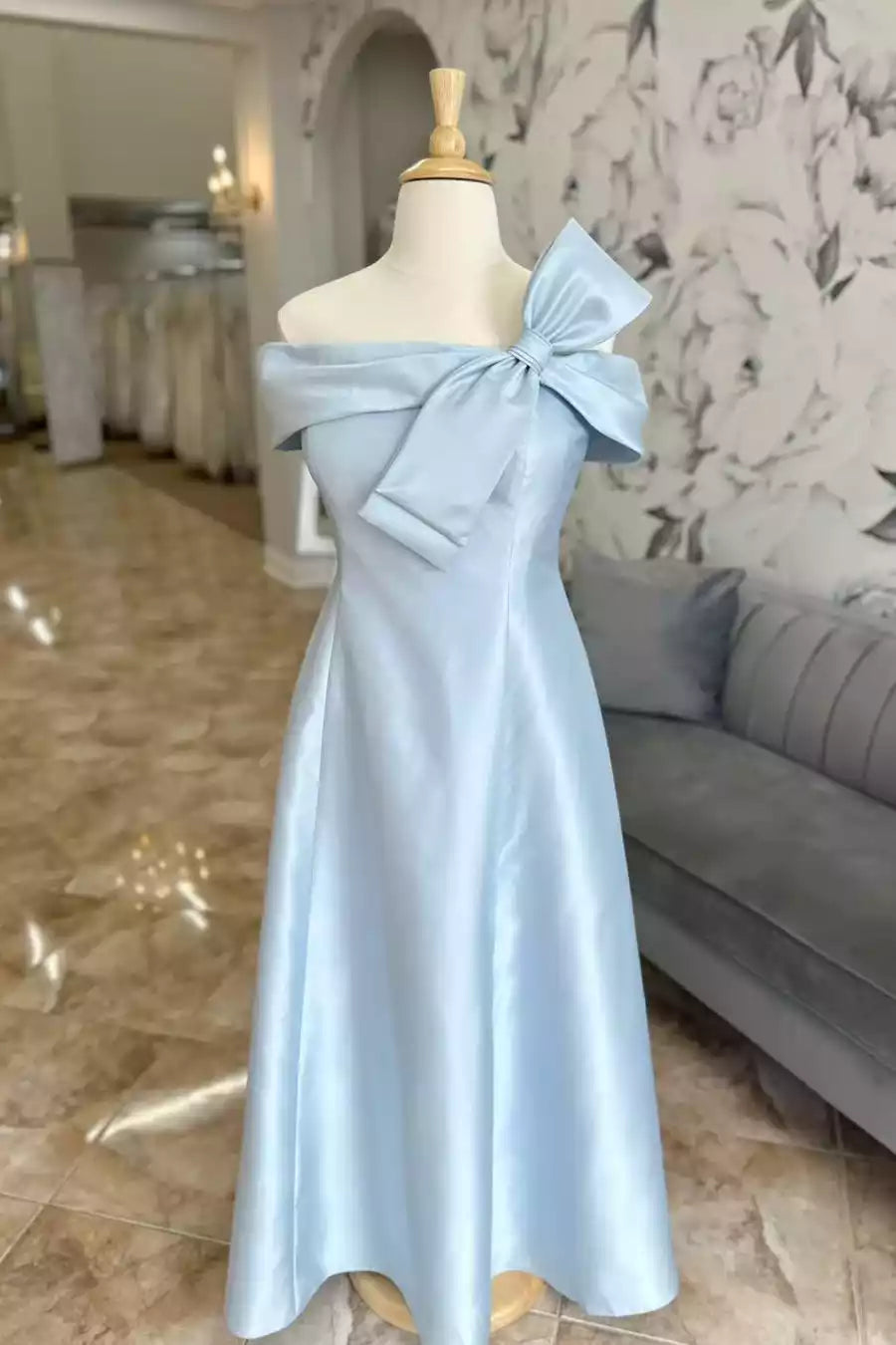 Ethereal Sky Blue Satin Gown with Off-the-Shoulder & Oversized Bow Detail