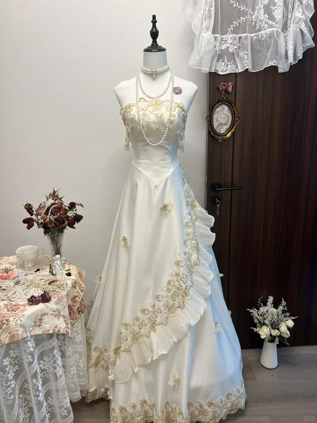Ivory Strapless Sweetheart Neckline Gold Lace Applique Satin Gown with Ruffled Tulle Panels