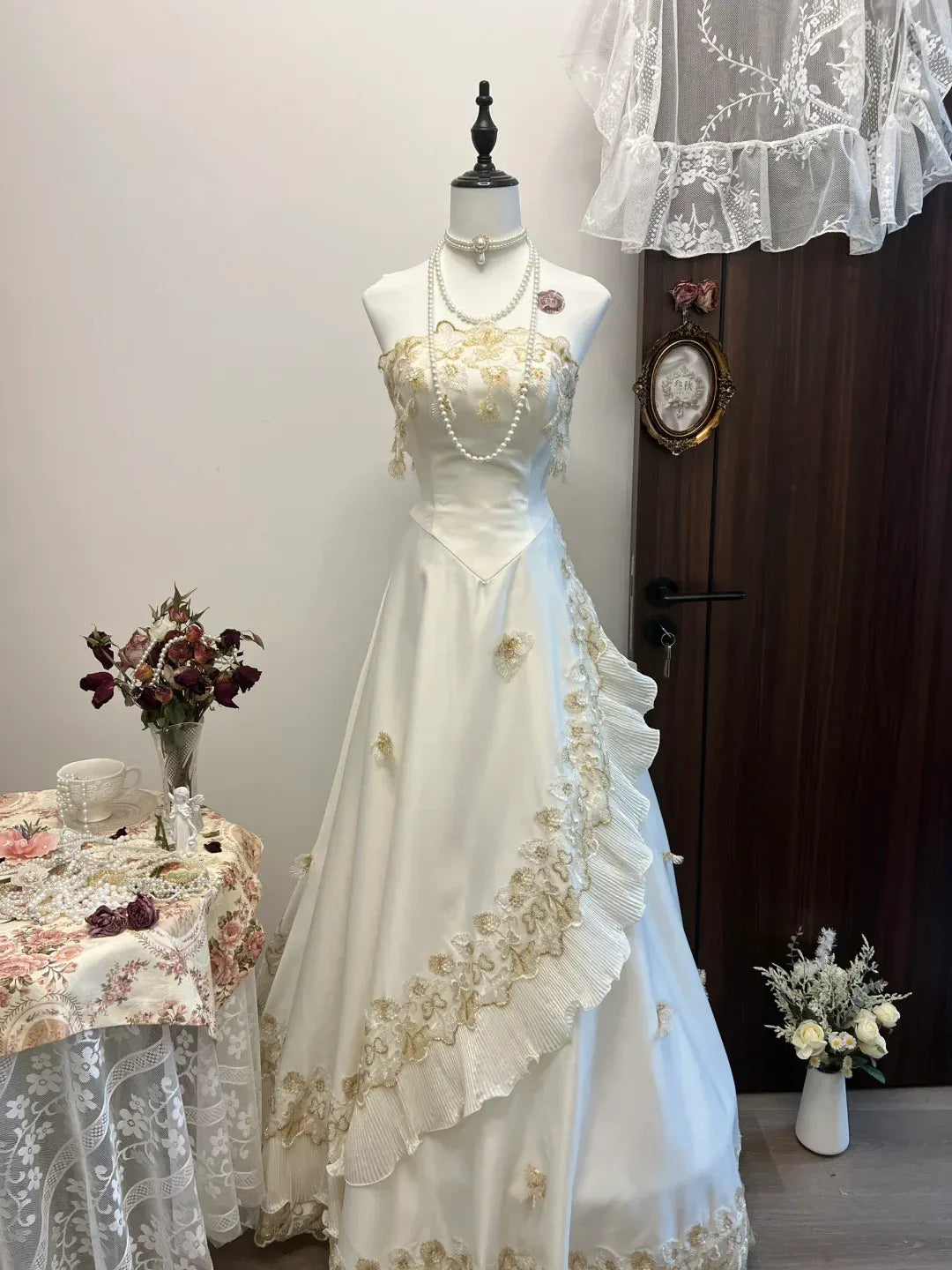 Ivory Strapless Sweetheart Neckline Gold Lace Applique Satin Gown with Ruffled Tulle Panels