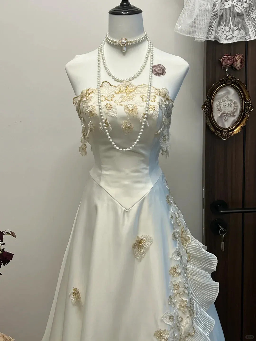 Ivory Strapless Sweetheart Neckline Gold Lace Applique Satin Gown with Ruffled Tulle Panels