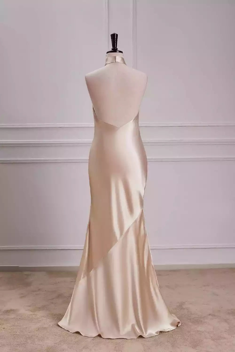 Luxe Champagne Satin Gown with Halter Neck & Open Back Mermaid Silhouette
