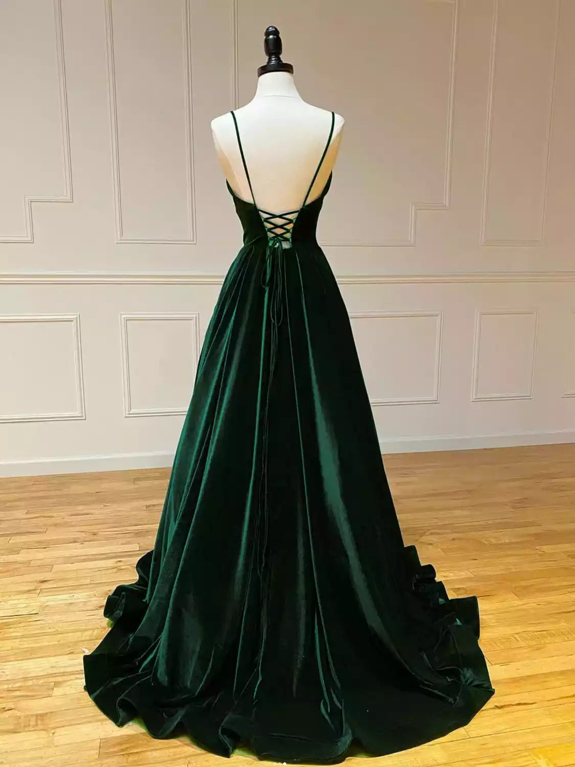 Luxurious Emerald Green Velvet Ballgown with Plunging V-Neck & Crisscross Back