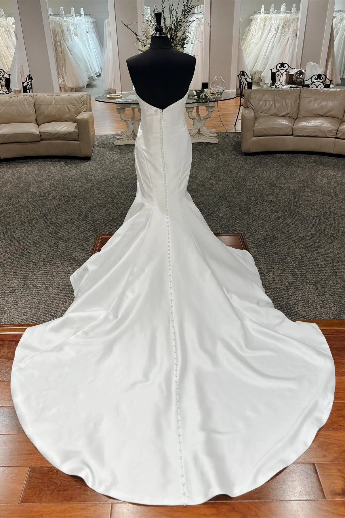 Luxury Wedding Dress with Draped Strapless Neckline and Cathedral Train