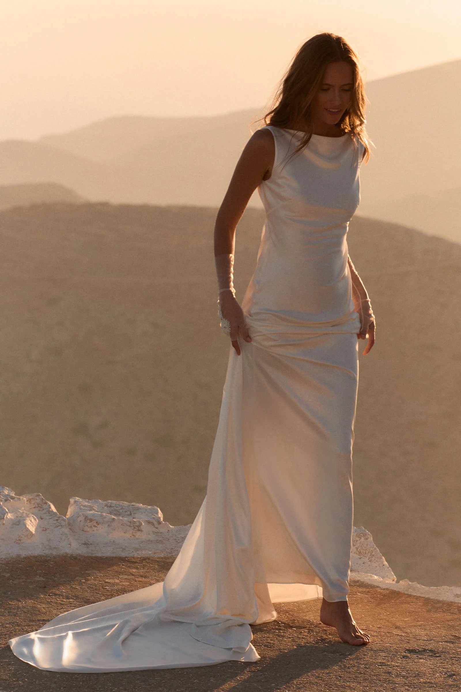 Minimalist Satin Wedding Dress with High Neck, Open Back and Draped Train