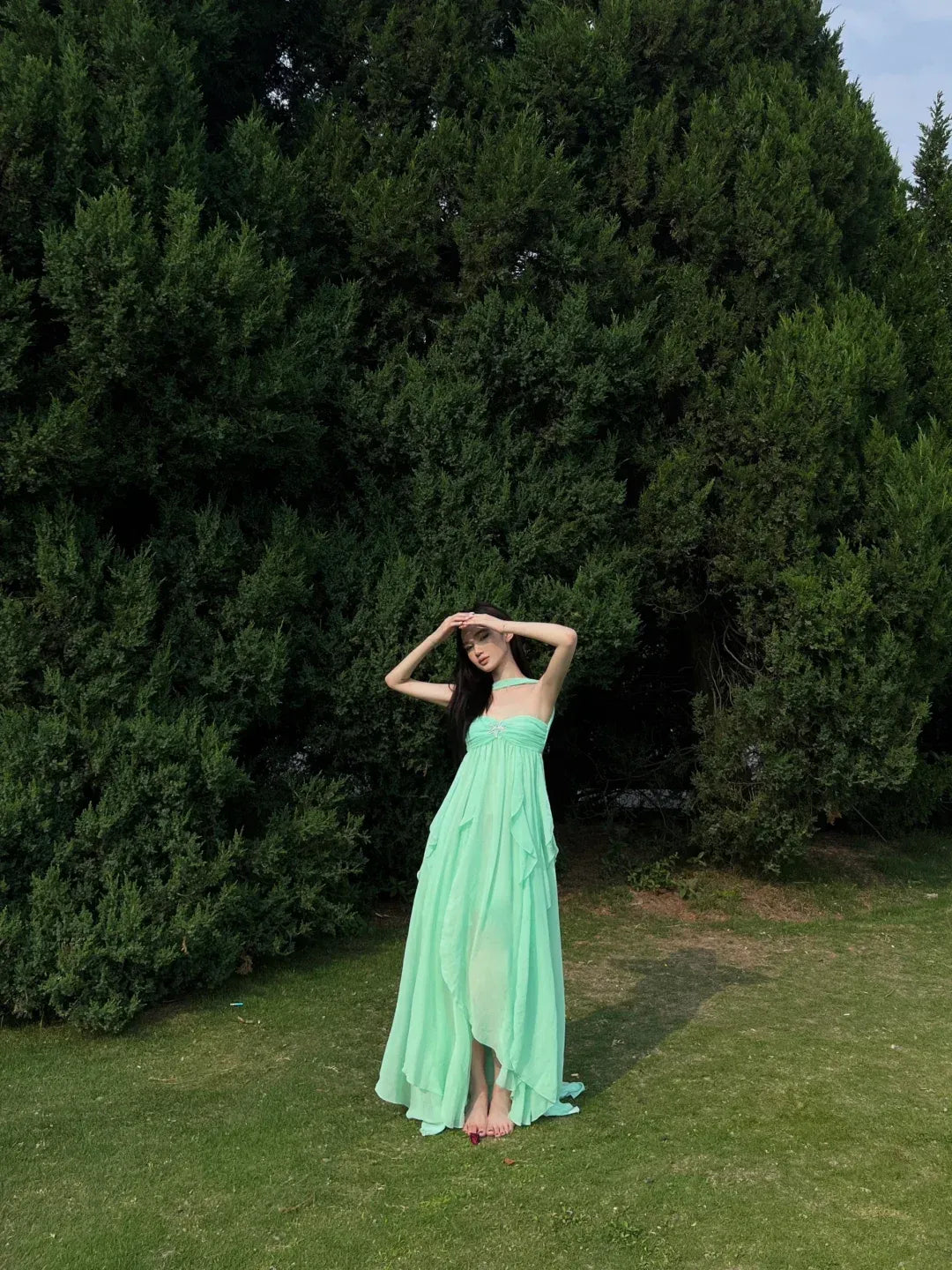Mint Green Halter Neck Ruffled Chiffon Gown with Crystal Accent