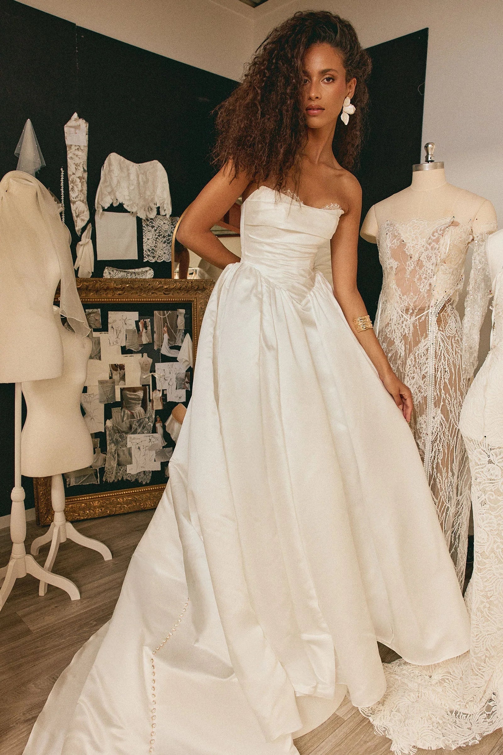 Modern Satin Wedding Dress with Strapless Neckline, Buttoned Back and Voluminous Train