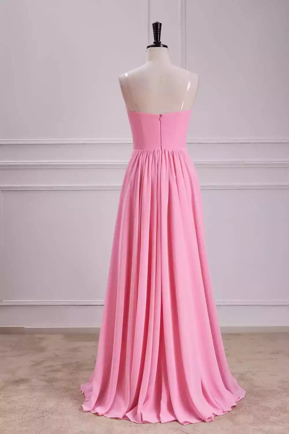 Playful Hot Pink Chiffon Gown with Strapless Design & Oversized Bow