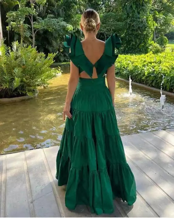 Regal Emerald Green Tiered Gown with Statement Ruffle Shoulders & Cutout Detail