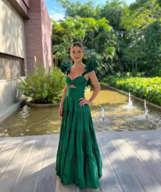 Regal Emerald Green Tiered Gown with Statement Ruffle Shoulders & Cutout Detail