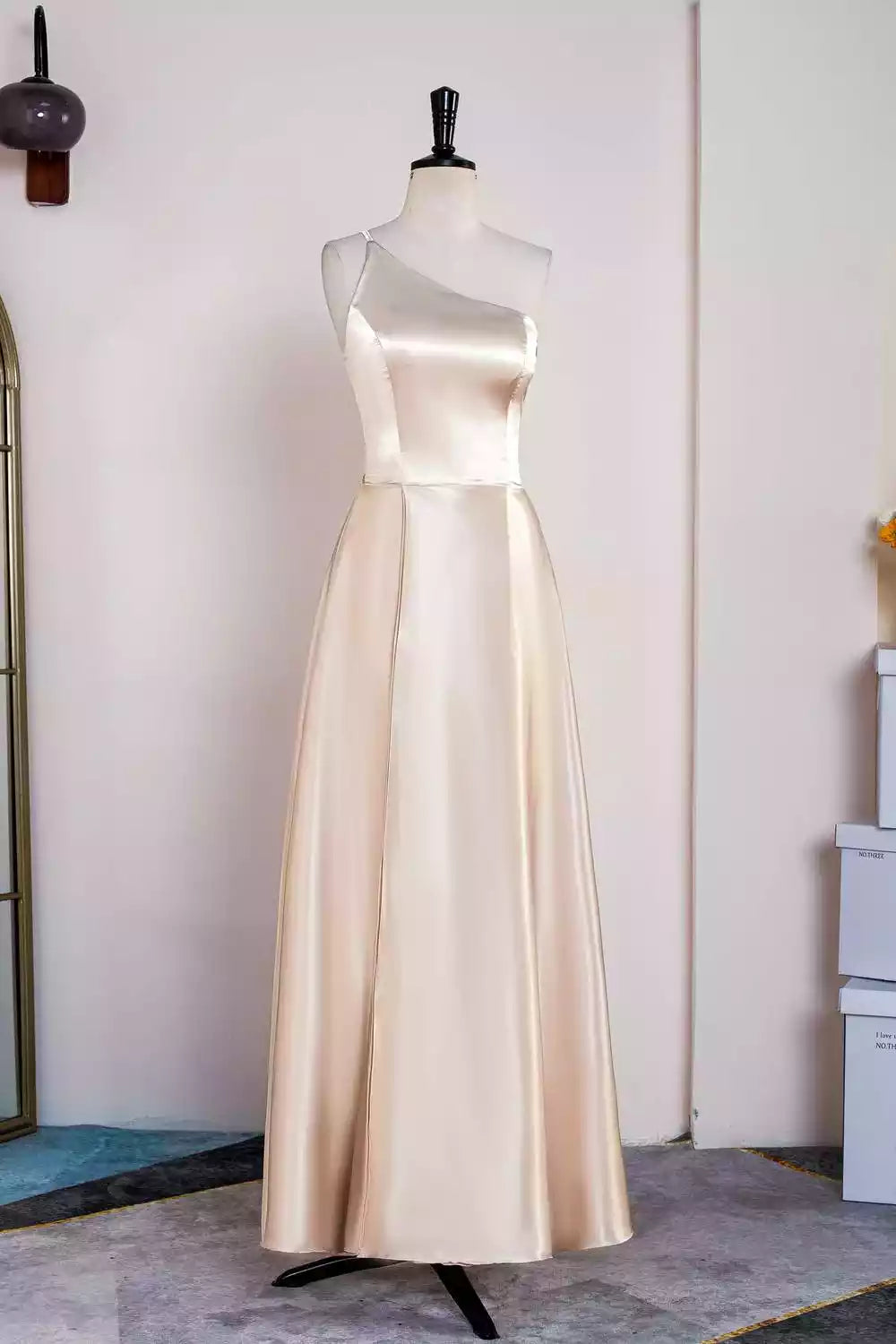 Sleek Champagne Satin Gown with Asymmetrical Single Strap & A-Line Silhouette