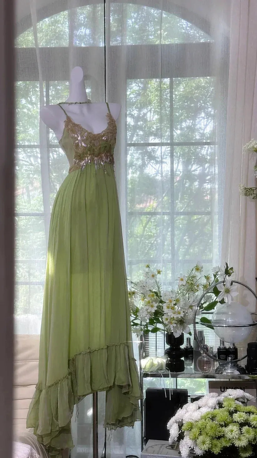 Spaghetti Strap V-Neck Evening Gown with Ruffle Hem & Backless Design