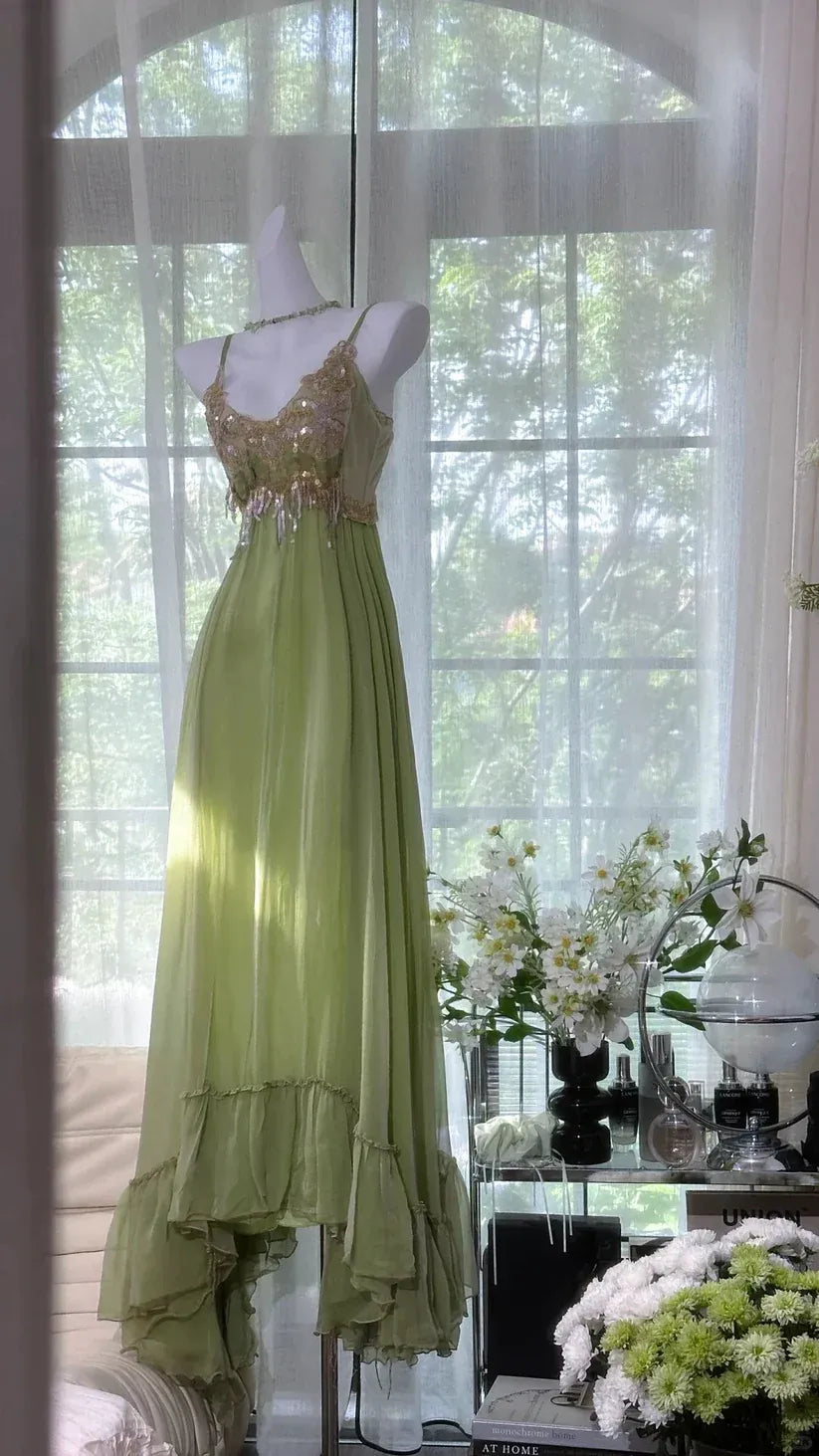 Spaghetti Strap V-Neck Evening Gown with Ruffle Hem & Backless Design
