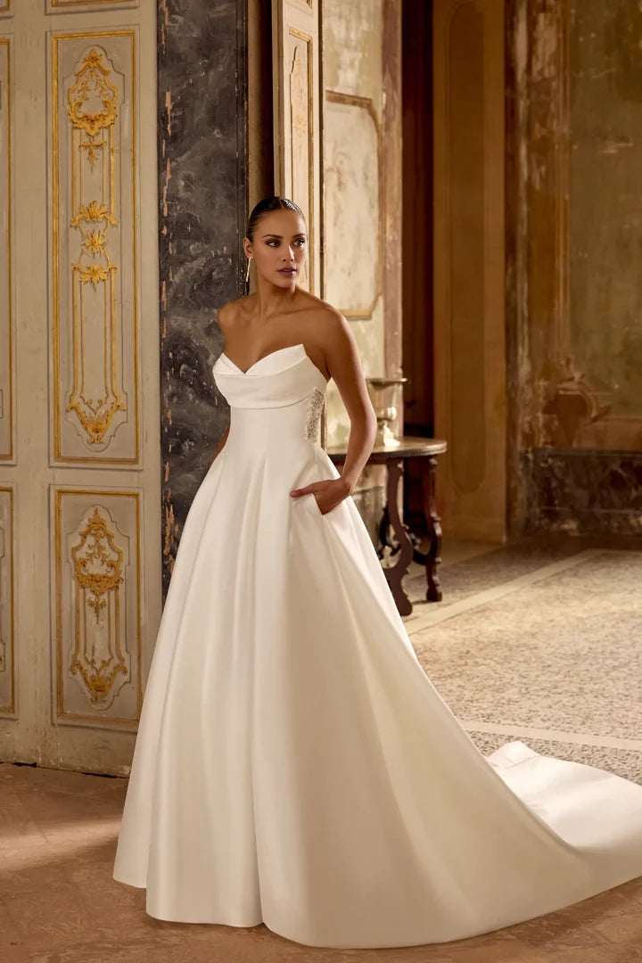 Strapless A-Line Gown with Intricate Beaded Illusion Back Wedding Dresses