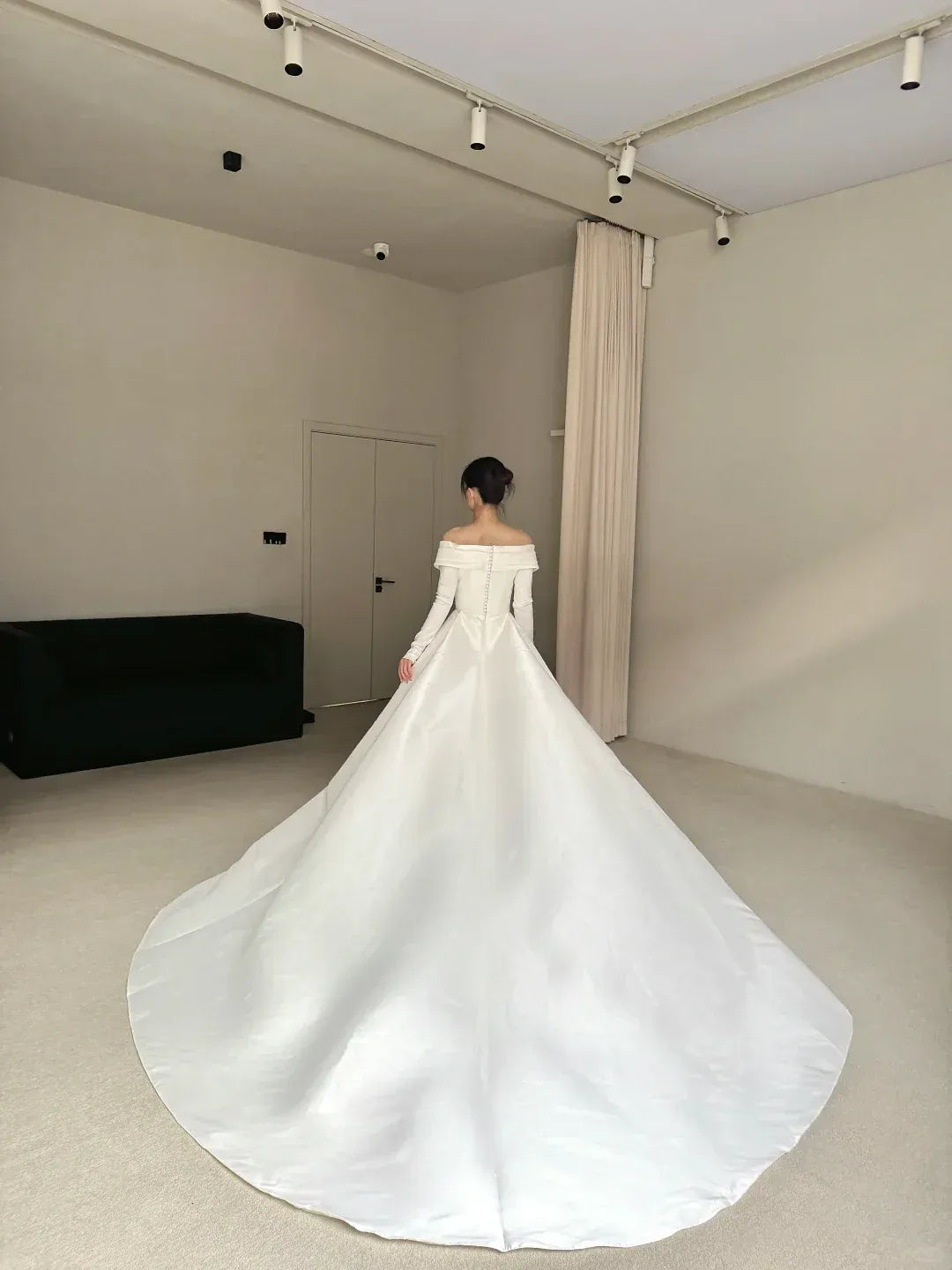 Timeless Off-The-Shoulder Long Sleeve Ivory Satin Ball Gown