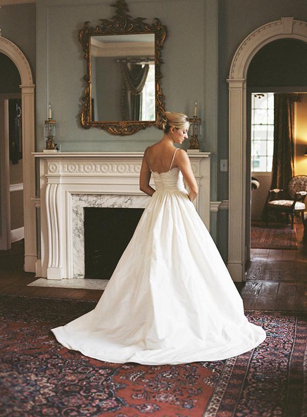 Timeless Wedding Dress with Lace Bodice and Voluminous Satin Ball Gown Skirt