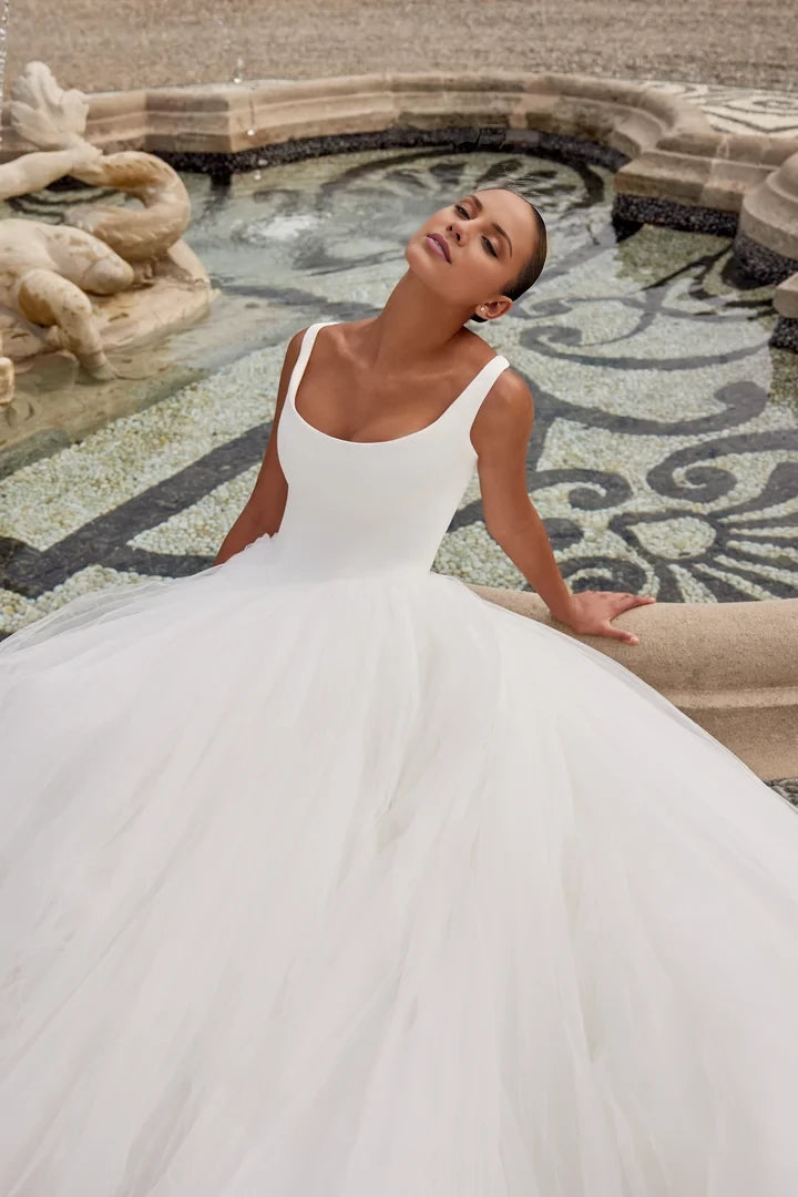 Tulle Ball Gown with Basque Waistline and Bow Accents Wedding Dresses