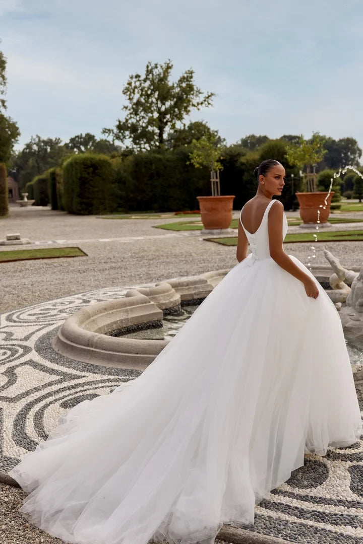 Tulle Ball Gown with Basque Waistline and Bow Accents Wedding Dresses