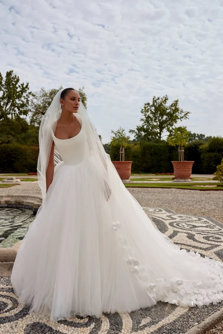 Tulle Ball Gown with Basque Waistline and Bow Accents Wedding Dresses